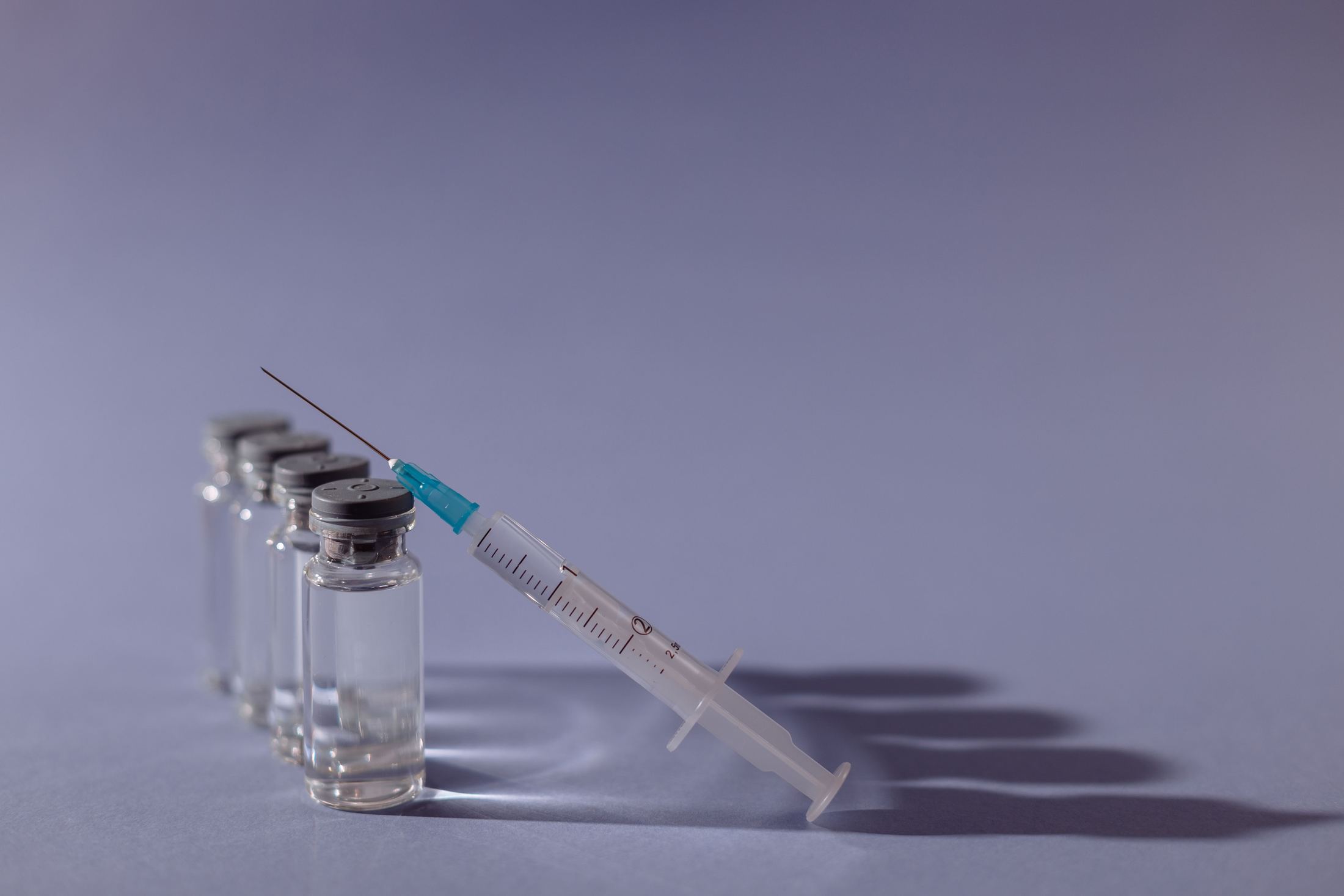 Peptide medication vials and a syringe