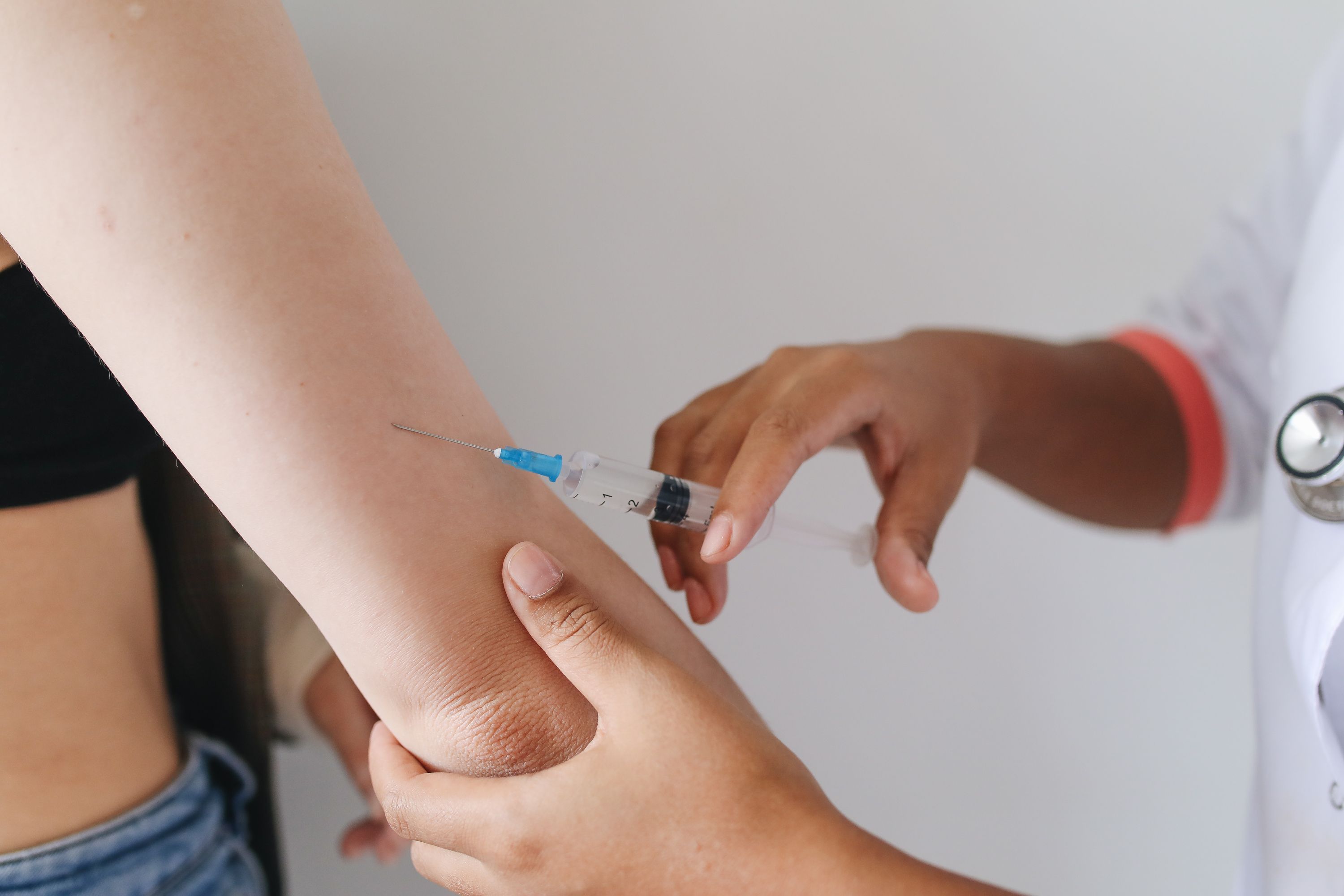 A provider administering a regenerative injection